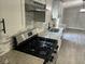 Modern kitchen with granite countertops, stainless steel appliances and tile backsplash at 106 Evergreen Trl, Cartersville, GA 30121