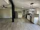 Updated kitchen featuring stainless steel appliances, updated cabinets and modern lighting at 106 Evergreen Trl, Cartersville, GA 30121