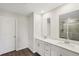 Bathroom features a double vanity with large mirrors at 1270 Firefly Field Trce, Lawrenceville, GA 30045