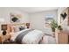 Staged bedroom featuring natural light, modern decor and a serene aesthetic at 1270 Firefly Field Trce, Lawrenceville, GA 30045