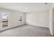 This bedroom features a door to a balcony and large window at 1270 Firefly Field Trce, Lawrenceville, GA 30045