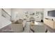 Bright staged living room features a plush sofa and two accent chairs at 1270 Firefly Field Trce, Lawrenceville, GA 30045