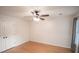 Bedroom featuring hardwood floors, a ceiling fan, and natural light at 2019 Chelton Se Way, Smyrna, GA 30080