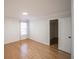 Bedroom with hardwood floors and natural light, adjoining the walk-in closet at 2019 Chelton Se Way, Smyrna, GA 30080