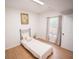 Bright bedroom with a large window and neutral walls at 2019 Chelton Se Way, Smyrna, GA 30080