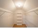 Walk-in closet with shelving and wooden floors; ideal for storage at 2019 Chelton Se Way, Smyrna, GA 30080