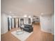 Open-concept living area with a kitchenette and ample natural light at 2019 Chelton Se Way, Smyrna, GA 30080