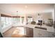 Bright open-concept with hardwood floors, large windows, and a view to the living area at 2019 Chelton Se Way, Smyrna, GA 30080