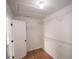 Walk-in closet featuring hardwood floors, wire shelving, and ample storage space at 2019 Chelton Se Way, Smyrna, GA 30080