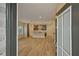 Open-concept living space flows into the modern kitchen with an island at 4680 Hemingway Trl, Cumming, GA 30041