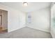 Bright bedroom with window and hallway access at 4690 Hemingway Trl, Cumming, GA 30041