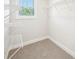 Walk-in closet with shelving for optimal storage and organization at 4690 Hemingway Trl, Cumming, GA 30041