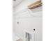 Laundry room featuring washer and dryer hookups and storage shelving at 4690 Hemingway Trl, Cumming, GA 30041