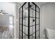 Bathroom features modern shower stall and views to the living area at 315 Mckees Rock Ln, Lawrenceville, GA 30044
