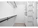 Organized closet with shelving, drawers, and hanging racks for optimal storage at 315 Mckees Rock Ln, Lawrenceville, GA 30044
