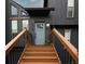 A close-up of the home's entry steps and front door showing detailed architectural features and design at 315 Mckees Rock Ln, Lawrenceville, GA 30044