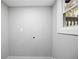 Laundry room offers a practical space with a bright window and simple, clean design for easy chores at 315 Mckees Rock Ln, Lawrenceville, GA 30044