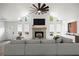 Staged living room with vaulted ceilings, fireplace, and comfortable seating, creating an inviting atmosphere at 315 Mckees Rock Ln, Lawrenceville, GA 30044