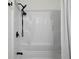Clean shower with a single shower head and a shower curtain at 315 Mckees Rock Ln, Lawrenceville, GA 30044