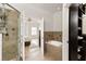 Modern bathroom features a glass shower, soaking tub, and tile accents at 5523 Glenridge Ne Park, Atlanta, GA 30342