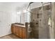 Bathroom with double sink vanity and a tiled walk-in shower with a shower head at 5523 Glenridge Ne Park, Atlanta, GA 30342