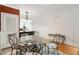 Cozy dining room featuring a glass table with seating for four and hardwood floors at 5523 Glenridge Ne Park, Atlanta, GA 30342