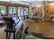 A well-lit gym offers workout equipment with large windows and mirrors at 5523 Glenridge Ne Park, Atlanta, GA 30342