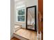 Hallway view shows a staircase and mirror which reflects the interior design at 5523 Glenridge Ne Park, Atlanta, GA 30342