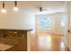 Bright dining room adjacent to the kitchen featuring hardwood floors at 5523 Glenridge Ne Park, Atlanta, GA 30342