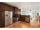 Bright kitchen featuring stainless appliances and wood floors at 5523 Glenridge Ne Park, Atlanta, GA 30342