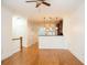 Open layout showing the kitchen and dining area with hardwood floors at 5523 Glenridge Ne Park, Atlanta, GA 30342