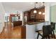 Spacious open concept kitchen with bar seating and stainless steel appliances at 5523 Glenridge Ne Park, Atlanta, GA 30342