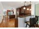 Open layout kitchen with island, stainless appliances, and breakfast bar at 5523 Glenridge Ne Park, Atlanta, GA 30342