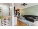 Cozy living room with a staircase, hardwood floors, and views of the kitchen at 5523 Glenridge Ne Park, Atlanta, GA 30342
