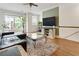 Bright and open living room with hardwood floors and an inviting atmosphere at 5523 Glenridge Ne Park, Atlanta, GA 30342
