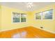 Comfortable bedroom with hardwood floors and natural light at 698 N Superior Ave, Decatur, GA 30033