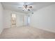 Neutral bedroom with a ceiling fan, access to the bathroom and closet at 751 Oneta Dr, Norcross, GA 30093