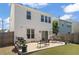Backyard features a well-kept lawn and spacious patio at 1711 Taynton Cir, Kennesaw, GA 30152