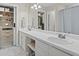 Bright bathroom featuring double sink and walk-in closet at 1711 Taynton Cir, Kennesaw, GA 30152