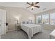 Bright Primary bedroom featuring vaulted ceiling and windows with natural light at 1711 Taynton Cir, Kennesaw, GA 30152