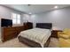 Comfortable bedroom featuring plush carpeting, window with shutters and a contemporary design at 2673 Rainbow Forest Dr, Decatur, GA 30034