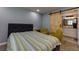 Bedroom with a wooden sliding barn door leading to a bathroom with double sinks at 2673 Rainbow Forest Dr, Decatur, GA 30034