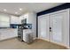 Well-lit modern kitchen featuring new appliances and stylish blue backsplash at 2673 Rainbow Forest Dr, Decatur, GA 30034