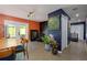 Living room with modern track lighting, wood flooring, and access to the backyard at 2673 Rainbow Forest Dr, Decatur, GA 30034