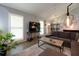 Inviting living room with ample natural light, hardwood floors, and an open layout at 2673 Rainbow Forest Dr, Decatur, GA 30034