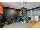 Bright sitting area with unique accent wall, light-colored wood flooring, and stylish decor at 2673 Rainbow Forest Dr, Decatur, GA 30034