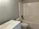 Bathroom with toilet, tub, and vanity at 4018 Dorchester Nw Walk, Kennesaw, GA 30144