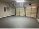 Two-car garage with automatic doors, and painted floor at 4018 Dorchester Nw Walk, Kennesaw, GA 30144