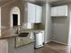 Kitchen with granite counters, stainless steel dishwasher and sink area at 4018 Dorchester Nw Walk, Kennesaw, GA 30144