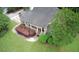 Aerial view of home showing covered porch, manicured landscaping and a large, well-maintained lawn at 25 Derby Dr, Hiram, GA 30141